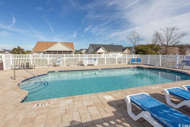 view of pool featuring a patio