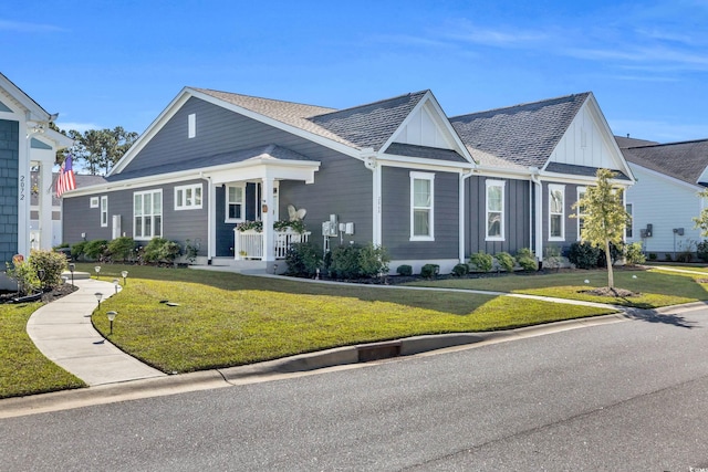 ranch-style home with a front lawn