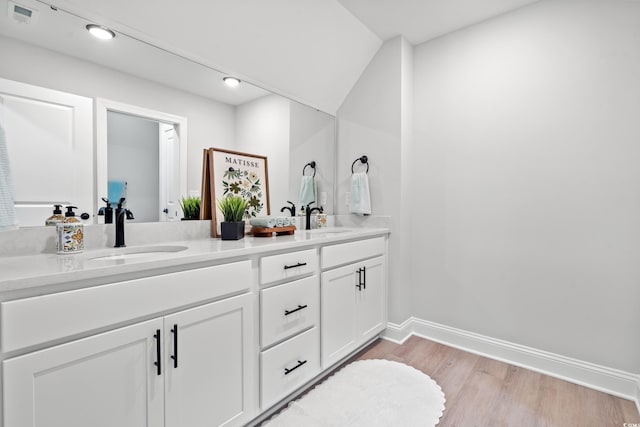 852 Comanders Island Rd, Georgetown, SC 29440 - full bathroom featuring double vanity, wood finished floors, recessed lighting, and baseboards