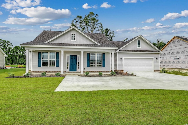 ranch-style home with a front yard and a garage