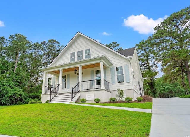 805 Comanders Island Rd, Georgetown, SC 29440 - bungalow-style house featuring a porch, a front yard, stairway, and a ceiling fan