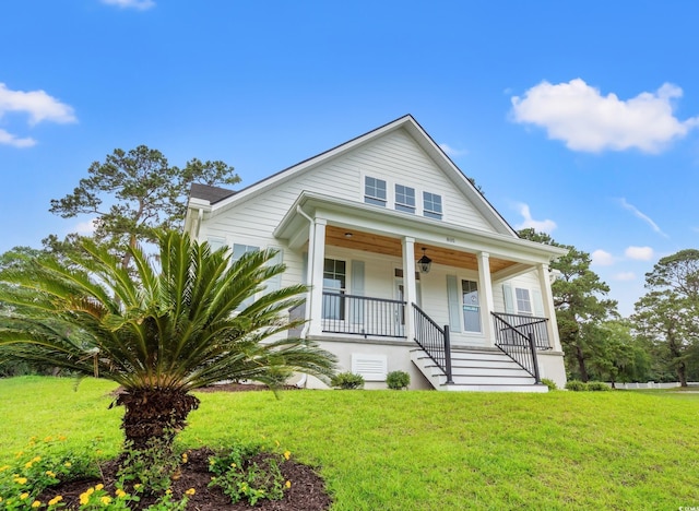 805 Comanders Island Rd, Georgetown, SC 29440 - bungalow-style home featuring covered porch, a front lawn, and stairs