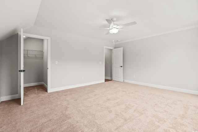 805 Comanders Island Rd, Georgetown, SC 29440 - unfurnished bedroom featuring light carpet, a spacious closet, baseboards, and lofted ceiling