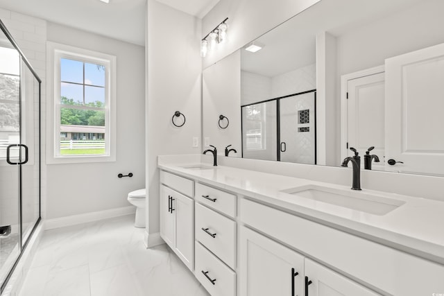805 Comanders Island Rd, Georgetown, SC 29440 - full bath featuring marble finish floors, double vanity, toilet, a stall shower, and baseboards