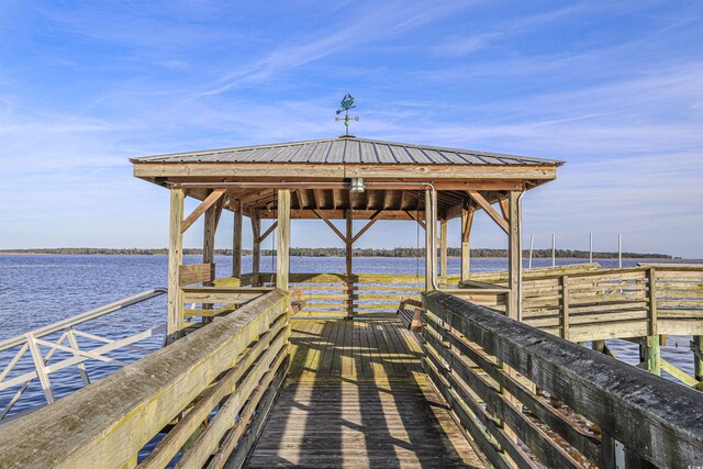 dock area featuring a water view