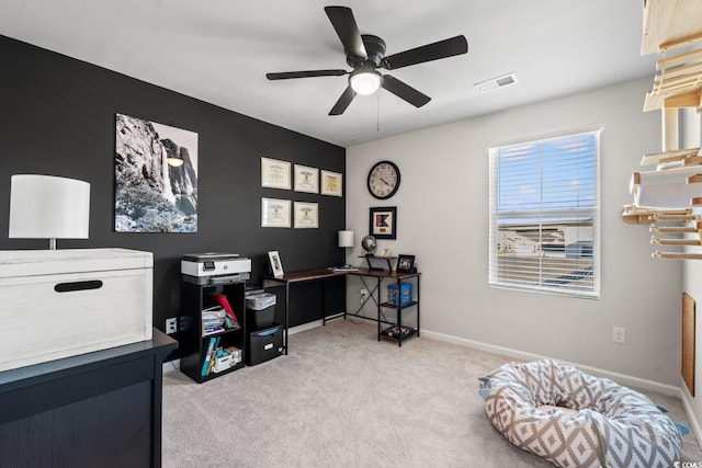 office area featuring ceiling fan and light carpet