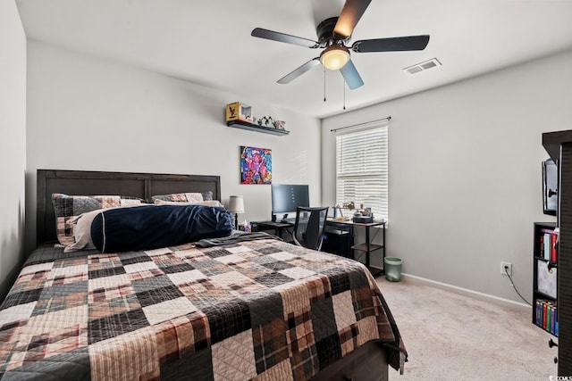 bedroom featuring ceiling fan and light colored carpet