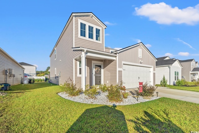 view of front of property with a front yard and a garage