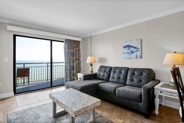 tiled living room featuring a water view and crown molding