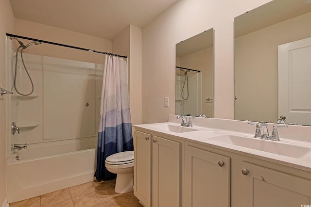 full bathroom with toilet, shower / bath combination with curtain, vanity, and tile patterned floors