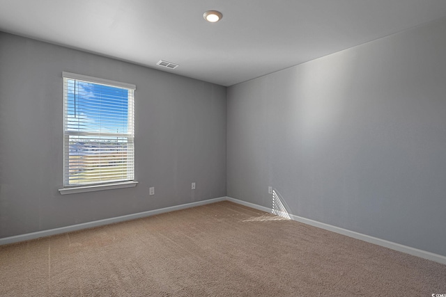 unfurnished room featuring carpet floors