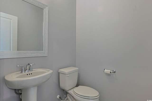 bathroom featuring toilet