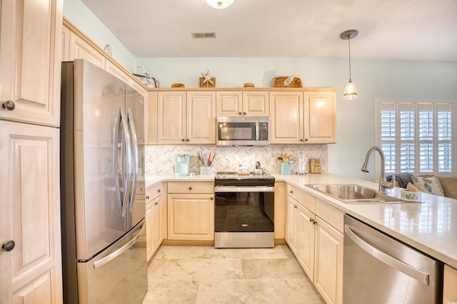 5102 Sweetwater Blvd -, Unit Murrells Inlet, SC 29576 - kitchen with appliances with stainless steel finishes, light brown cabinetry, decorative backsplash, and light countertops