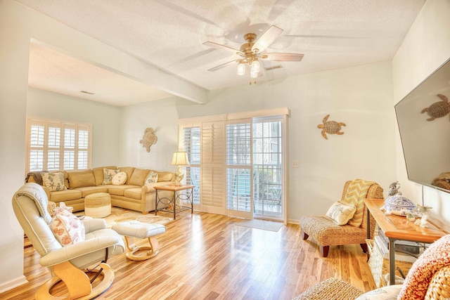 5102 Sweetwater Blvd -, Unit Murrells Inlet, SC 29576 - living area featuring a textured ceiling, wood finished floors, ceiling fan, and beam ceiling