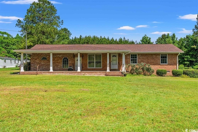 ranch-style home featuring a front yard