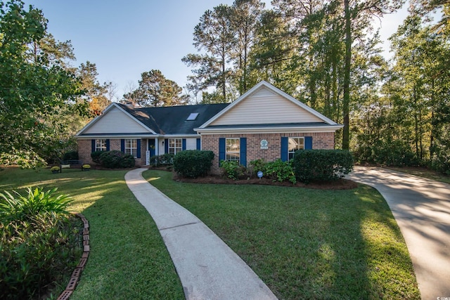 ranch-style house with a front lawn