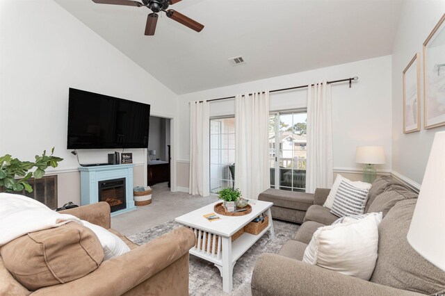 4878 Dahlia Ct Unit 24-304, Myrtle Beach, SC 29577 - living area with ceiling fan, baseboards, high vaulted ceiling, a glass covered fireplace, and light colored carpet