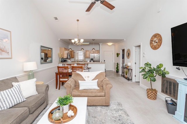 4878 Dahlia Ct Unit 24-304, Myrtle Beach, SC 29577 - living area with a ceiling fan, vaulted ceiling, a chandelier, and light carpet