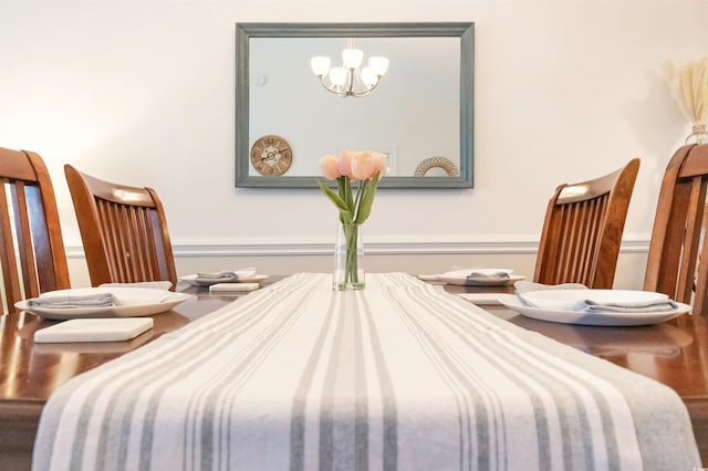 4878 Dahlia Ct Unit 24-304, Myrtle Beach, SC 29577 - bedroom with a chandelier
