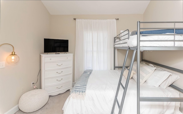 4878 Dahlia Ct Unit 24-304, Myrtle Beach, SC 29577 - bedroom featuring carpet floors, vaulted ceiling, and baseboards