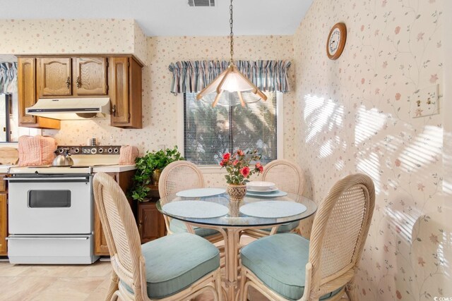 view of tiled dining space