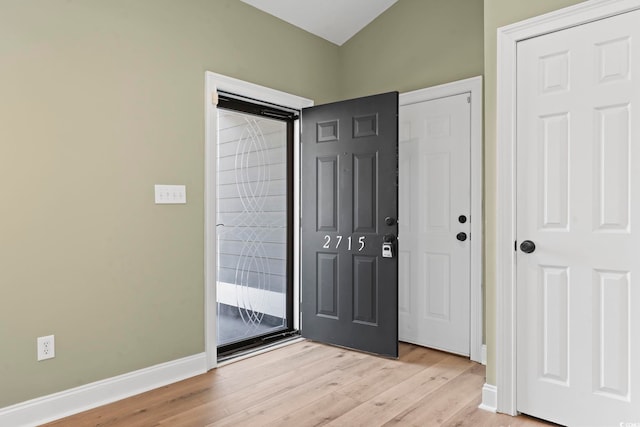 entrance foyer with light hardwood / wood-style floors