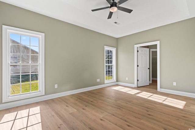 spare room featuring ceiling fan and light wood-type flooring