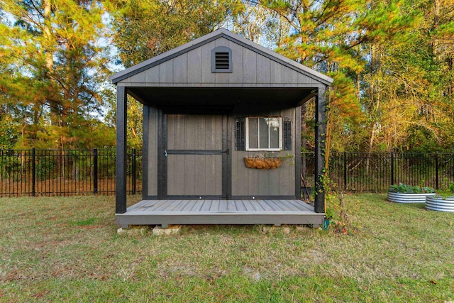 view of outdoor structure with a lawn