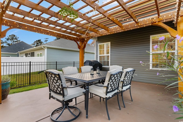 view of patio featuring area for grilling and a pergola