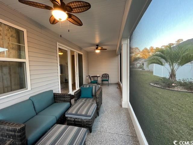 view of patio / terrace with ceiling fan and an outdoor hangout area