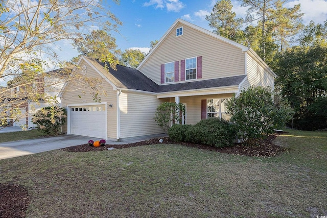 view of front facade featuring a garage and a front yard