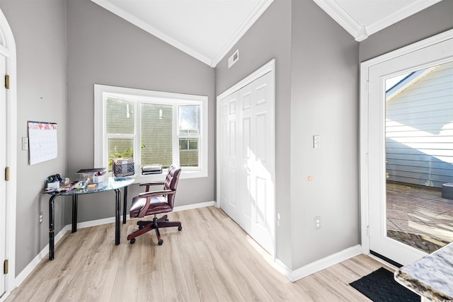 home office featuring crown molding, light hardwood / wood-style floors, and lofted ceiling