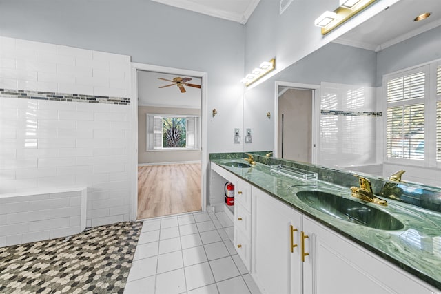 bathroom featuring tile patterned floors, ceiling fan, a healthy amount of sunlight, and crown molding