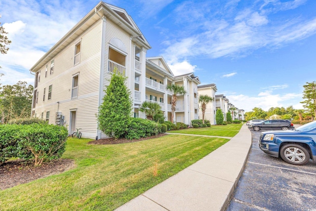 612 River Oaks Dr Unit 55D, Myrtle Beach, SC 29579 - view of property featuring uncovered parking