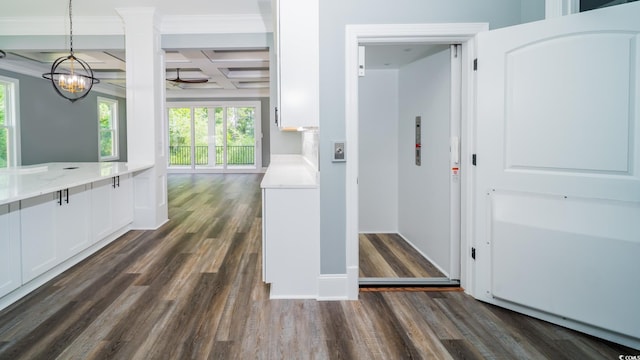1010 Club House Dr, North Myrtle Beach, SC 29582 - washroom featuring dark wood-type flooring and a chandelier