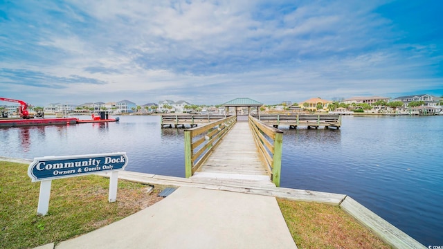 dock area featuring a water view