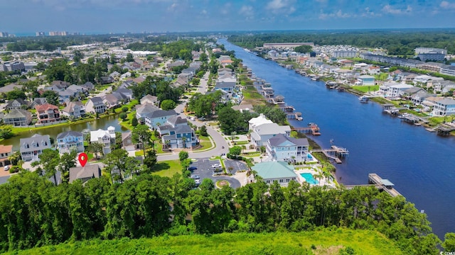 1010 Club House Dr, North Myrtle Beach, SC 29582 - aerial view of property's location featuring a nearby body of water and nearby suburban area