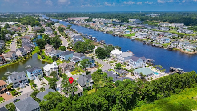 1010 Club House Dr, North Myrtle Beach, SC 29582 - aerial view of property's location with nearby suburban area and a nearby body of water
