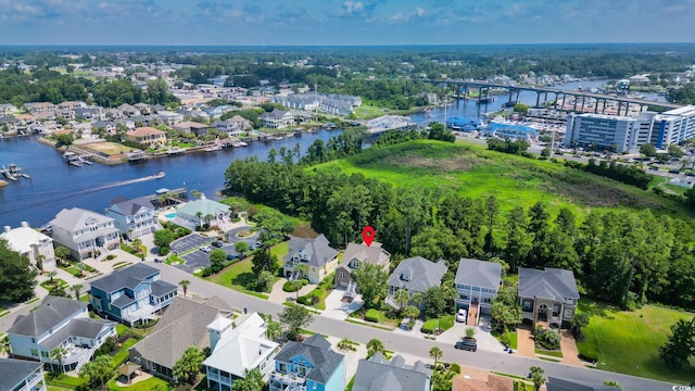 1010 Club House Dr, North Myrtle Beach, SC 29582 - aerial view of residential area with a nearby body of water