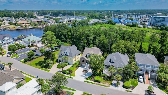1010 Club House Dr, North Myrtle Beach, SC 29582 - aerial perspective of suburban area featuring a nearby body of water and a notable bridge