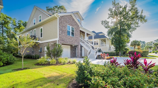 1010 Club House Dr, North Myrtle Beach, SC 29582 - view of property exterior featuring brick siding, stairs, a lawn, an attached garage, and covered porch