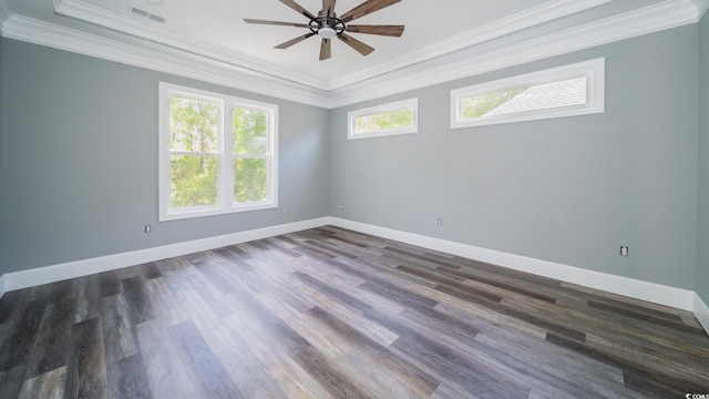 1010 Club House Dr, North Myrtle Beach, SC 29582 - spare room featuring crown molding, a ceiling fan, a tray ceiling, baseboards, and dark wood finished floors
