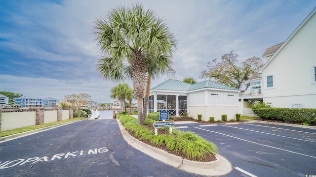1010 Club House Dr, North Myrtle Beach, SC 29582 - view of front of home featuring uncovered parking