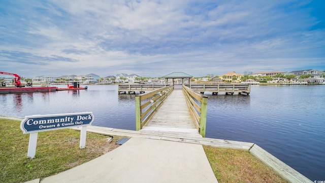 1010 Club House Dr, North Myrtle Beach, SC 29582 - dock featuring a water view, a gazebo, and a residential view