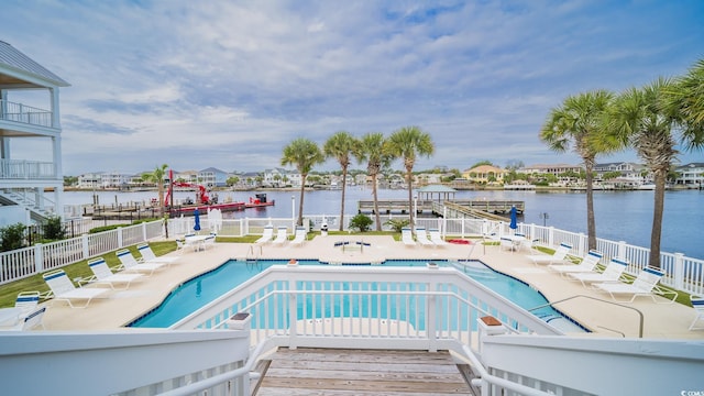 1010 Club House Dr, North Myrtle Beach, SC 29582 - community pool with a water view and a patio