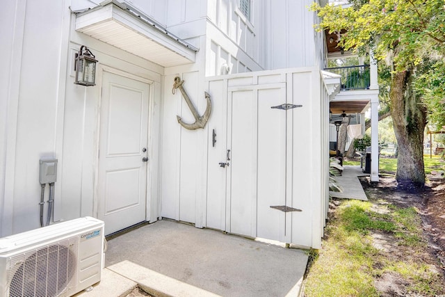 property entrance featuring ac unit