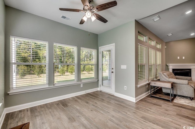 entryway featuring ceiling fan and light wood-type flooring