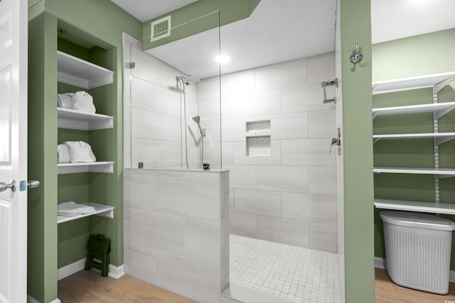 2151 Bridge View Ct Unit 2502, North Myrtle Beach, SC 29582 - full bathroom featuring walk in shower and wood finished floors