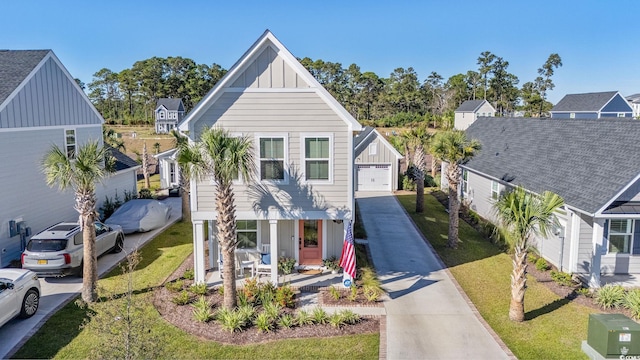 view of front of home with a front yard and a porch