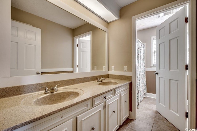 bathroom featuring vanity and tile patterned floors